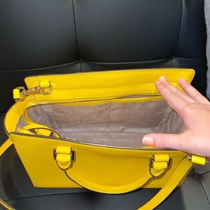 A Michael Kors Jasmine yellow medium top zip